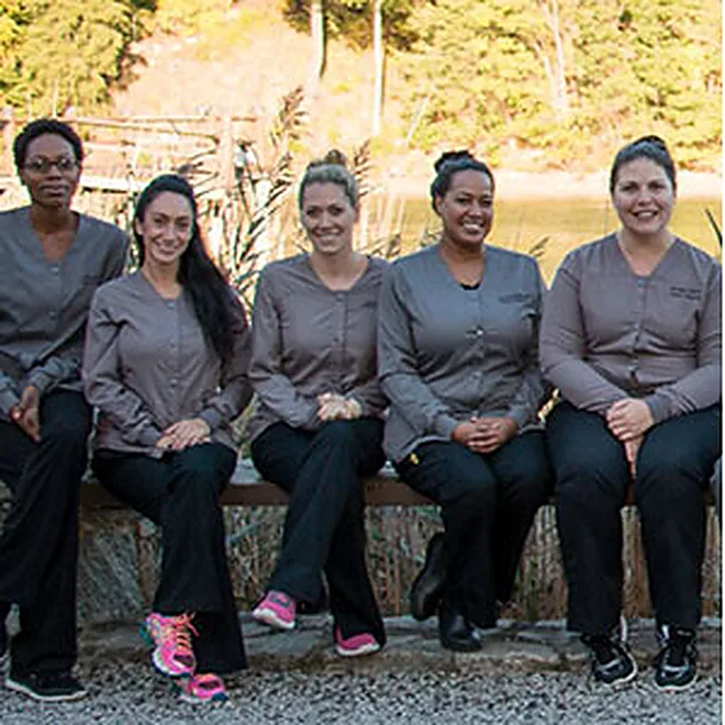 The team at Westport Dental Associates, photographed outside the practice.