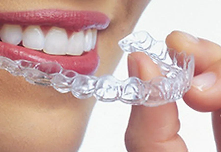 A clear Invisalign aligner.